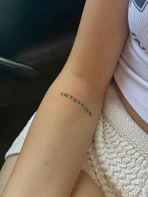 Mini Leg Tattoo, Word Tattoos For Women Arm, One Word Forearm Tattoos, Tattoos For Intuition, One Word Arm Tattoo, Tattoos About Intuition, 1 Word Tattoos For Women, Worded Tattoos For Women, Intuitive Tattoo Ideas