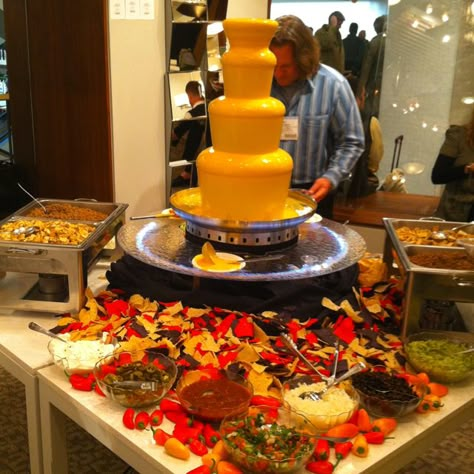 Oh my is that a nacho cheese fountain???Make your own nachos!