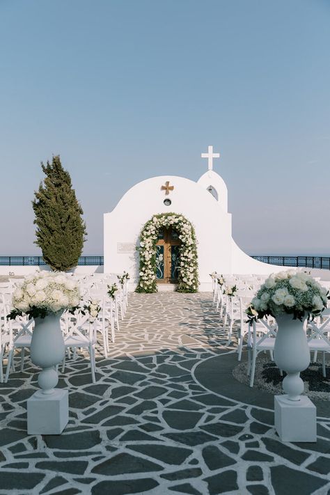 Contemporary Wedding in Kallithea Springs located in Rhodes, Greece. The ceremony took place in St. Sophia, with Faliraki sea view. We decorated the reception with stone, glass and mirrored elements. The flowers were white and greenery was used to make the black & white theme stand out. #destinationweddings #Greece #Rhodes #island #contemporarywedding #blackandwhite #weddingtheme #weddingdecor #weddingevent #weddingphotography #weddingplanning #faliraki #seaview #ceremony #flowerurns #arch Greek Wedding Theme, Rhodes Island Greece, Wedding Color Schemes Blue, Greek Islands Wedding, Small Beach Weddings, Greece Rhodes, Greece Destinations, Rhodes Island, Orthodox Wedding