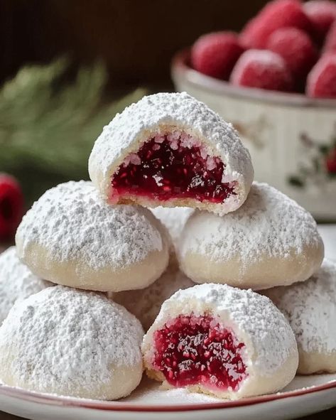 Raspberry-Filled Almond Snow Cookies – Festive Treat Raspberry-filled Almond Snow Cookies, Raspberry Filled Almond Cookies, Raspberry Filled Snowballs, Raspberry Almond Filled Snowball Cookies, Christmas Raspberry Cookies, Valentines Meringue Cookies, Sugar Cookie Cups Christmas, Ricotta Almond Cookies, Raspberry Almond Snowball Cookies