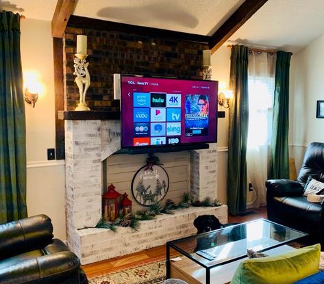 Mounted Tv Ideas Living Rooms With Fireplace, Pull Down Tv Over Fireplace, Ceiling Mount Tv Over Fireplace, Tv Over Real Fireplace Ideas, Hanging Tv Over Fireplace, Pull Down Tv Mount, Pull Out Tv Mount, Tv Mounted On The Wall Above Fireplace, Drop Down Tv Mount