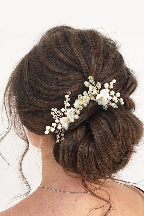 Eye-Catching Wedding Bun Hairstyles ❤ See more: http://www.weddingforward.com/wedding-bun-hairstyles/ #weddings Hairdo Wisuda, Bun Hairstyles Wedding, Hairstyle Graduation, Low Bun Bridal Hair, Grad Hair, Graduation Hair, Long Bridal Hair, Wedding Bun, Wedding Bun Hairstyles