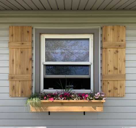 gorgeous cedar shutters/window box Small Window Shutters Exterior, Mobile Home Window Shutters, Front Window Shutters, Cedar Shutters On Vinyl Siding, Cedar Shutters And Window Boxes, Trailer Shutters Mobile Homes, Cedar Window Shutters, Window Box With Shutters, Wood Shutters On Vinyl Siding