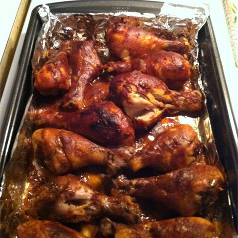 Baked drumsticks are smothered in a quick homemade barbeque sauce. Baked Bbq Chicken Legs, Chicken Drumsticks Oven, Chicken Legs In Oven, Baked Drumsticks, Oven Bbq Chicken, Bbq Chicken Drumsticks, Bbq Chicken Legs, Chicken Leg Recipes, Baked Bbq Chicken