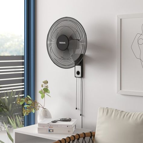 This oscillating wall-mount fan is a real problem solver. Can be controlled by either the rotary knob or the three-way pull cord. Features a sturdy metal frame. Fan Ideas, Basement Flooring Options, Unique Ceiling Fans, Basement Furniture, Wall Mounted Fan, Basement Floor, Table Fans, Floor Fans, Living Room Tv Unit Designs