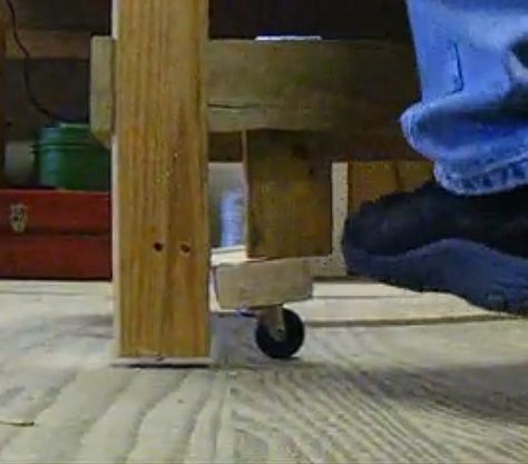 Retractable Wheels for a Worktable by 1stMaineCavalry -- Homemade means of inexpensively rendering a workbench or table mobile as detailed in a video. Consists of a design for retractable wheels as constructed from lumber, hinges, and casters. http://www.homemadetools.net/homemade-retractable-wheels-for-a-worktable Retractable Wheels, Workbench On Wheels, Retractable Casters, Workbench Casters, Furniture Wheels, Work Benches, Stained Glass Studio, Garage Work Bench, Workshop Ideas