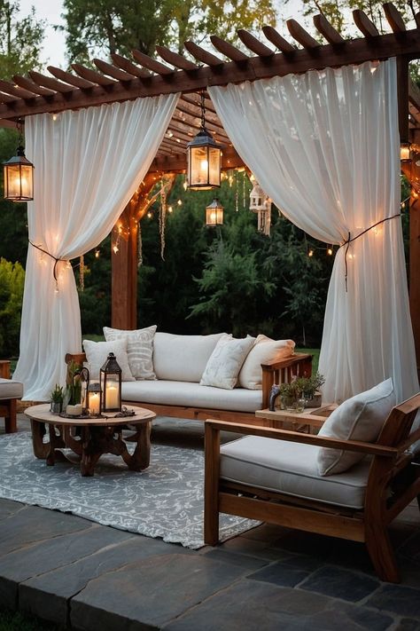 Design a dreamy patio with a pergola draped in sheer curtains and adorned with fairy lights. A perfect cozy retreat. Add timeless elegance to your space with classic balcony curtains Dubai, perfect for balconies that deserve grace. These classic designs beautifully combine functionality, offering shade while enhancing your outdoor decor with a hint of tradition.#BalconyCurtainsDubai #ClassicDesign #TerraceElegance #PatioStyle #OutdoorLuxury #BalconyMakeover #TimelessDecor #DubaiLiving Black And White Patio Decor, Pergola With Curtains, Dreamy Patio, Zen Retreat, Black And White Patio, Steel Decor, Balcony Curtains, Striped Rugs, Pergola Curtains