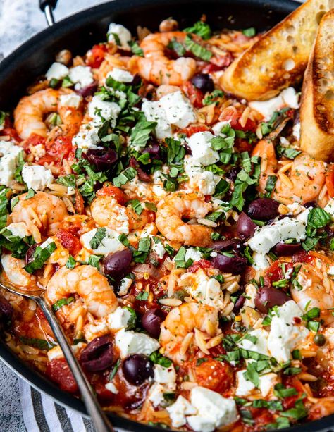 Perfect one pan dinner filled with orzo, shrimp, tomatoes, olives and capers, all topped off with fresh basil and feta cheese. Ready in about 30 minutes! Mediterranean Skillet, Sheet Pan Mediterranean, Mediterranean Shrimp, Garden In The Kitchen, Mediterranean Recipes Healthy, Today Is Monday, Mediterranean Diet Recipes Dinners, Shrimp Dinner, Easy Mediterranean Diet Recipes