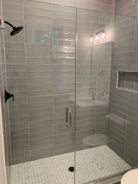 Grey Tile Shower Wall, Gray Bathroom Tile Ideas Wall, Dove Gray Tile Bathroom, White Grey Shower Tile Ideas, Grey Tile Walk In Shower Ideas, Grey Tile Shower Bathroom, Grey Glass Tile Bathroom, Gray Vertical Tile Shower Ideas, Gray Tiled Shower Ideas