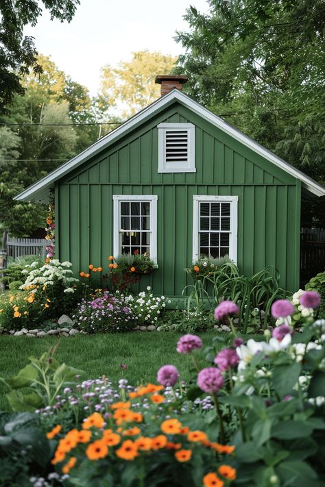 Fresh Green Home Exteriors for Max Curb Appeal Tennis Pavilion, Shed Color, Green Home Exterior, Modern Farmhouse Exterior Colors, Paint Combos, Farmhouse Exterior Colors, Farmhouse Sheds, Exterior Siding Options, Green House Exterior