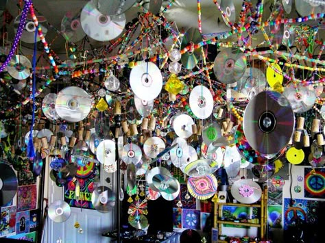 CDs hanging from ceiling but for the wedding...how about from trees? Jake loves music and has a huge CD collection. Things To Hang Off Ceiling, Bedroom Ceiling Decorations Hanging, Cds Hanging From Ceiling, Diy Things To Hang From Ceiling, Stuff To Hang On Your Ceiling, Stuff To Hang From Ceiling Bedrooms, Things Hanging From Ceiling, Ceiling Collage, Hanging Cds