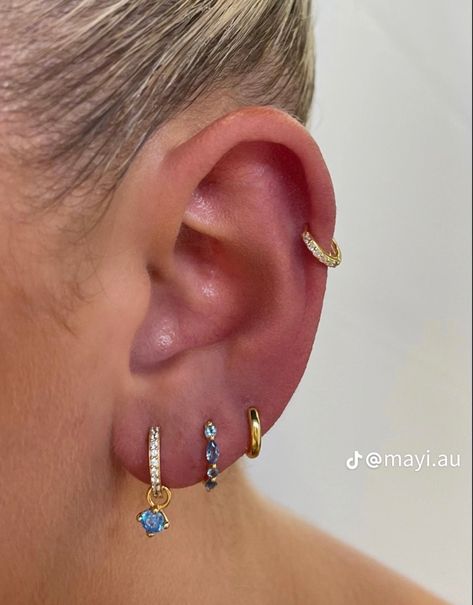 Gold blue jewelry earings ear piercing Earring Stack Ideas, 2nd Ear Piercing, Earring Stacks, Unique Ear Piercings, Ear Piercings Chart, Earring Inspo, Earring Stack, Pretty Ear Piercings, Cute Ear Piercings