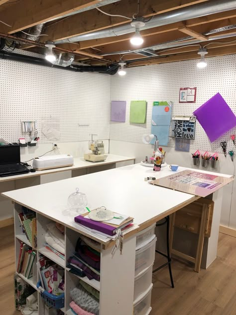 Basement craft room Craft Area Basement, Garage Conversion To Craft Room, Craft Room In Basement, Basement Craft Room Ideas On A Budget, Basement Craft Room Ideas Unfinished, Unfinished Basement Art Studio, Basement Sewing Room Ideas, Unfinished Basement Craft Room, Craft Basement