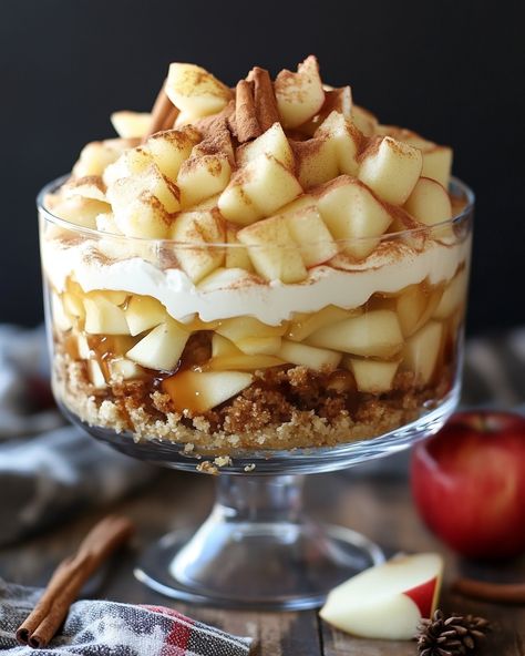 "This Apple Cinnamon Trifle is a cozy dessert that's perfect for fall! It layers sweet apples, creamy vanilla pudding, and crunchy graham crackers. You’ll be craving this comforting treat!  For three decades, I've been making this trifle recipe every autumn. It's sweet, crunchy, and just brings back so many happy memories around the table!  Ingredients: - 3 cups of diced apples - 1 teaspoon of cinnamon - 2 cups of vanilla pudding (Link in first comment [👇] [👇]  Enjoy this delightful dessert with friends and family!  #AppleCinnamon #TrifleRecipe #FallDessert #ComfortFood #YummyDessert" Cinnamon Trifle, Dessert Truffles, Sweet Apples, Apple Trifle, Trifle Desserts, Diced Apples, Trifle Recipe, Fall Apples, Vanilla Pudding