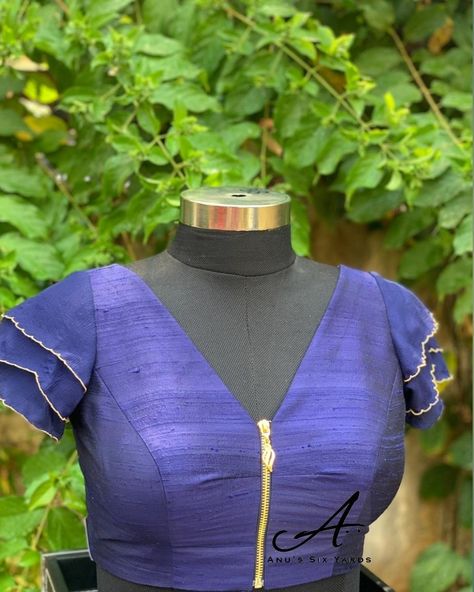 Sixyards brings in a vibrant Amethyst colour raw silk blouse paired with truffle sleeves and a ravishing low neck ready to wear blouse in size 38 and a designer zip to make it fabulous with saree or long skirt to combine with....... Zip Blouse Design, Raw Silk Blouse, Blouse Designs Silk, Amethyst Color, Raw Silk, Blouse Design, Silk Blouse, Long Skirt, Blouse Designs