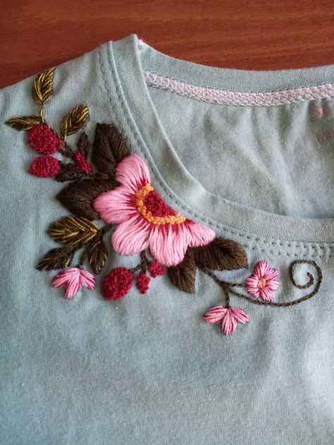 Embroidery|flat embroidery on T-shirts Shirt Hand Embroidery Design, Floral Embroidery Tshirt, Knitting Embroidery Pattern, Flower Bud Embroidery, Hand Embroidery Tshirt Ideas, Hand Embroidery Shirt Design, Embroidery Designs For T Shirts, Embroidery T Shirt Ideas, Embroidery Designs On Tshirt