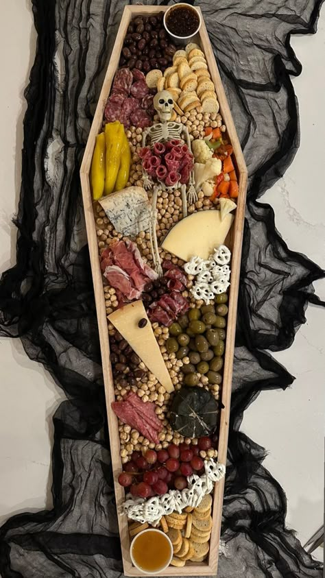 Halloween Wine And Cheese Party, Coffin Cheese Board, 2023 Halloween Party, Chic Halloween Party Food, Halloween Board Night, Skeleton Food Display, Halloween Charcutiere Board, Spooky Dinner Party Food, Halloween Birthday Party Ideas Adults