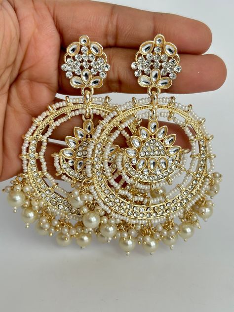 Gold Bollywood Stone Kundan Earrings Indian long Earrings/pearl Earring/Pakistani Earrings/Statement Earrings/Long chandelier/bridal earrings Length 3.5 inches Width 2.5 inches Arrives in a gift box Color, shades, and texture displayed may slightly vary from the actual product due to digital image limitations. We request that you to consider these minor variations. Please expect the possibility of some slight imperfections when buying handmade jewelry. If you have any questions, please contact u Multani Earrings, Chaandbali Kundan, Punjabi Jewellery, Kundan Chandbali, Chandbalis Earrings, Pakistani Earrings, Stained Glass Earrings, Promise Jewelry, Jewelry Kundan