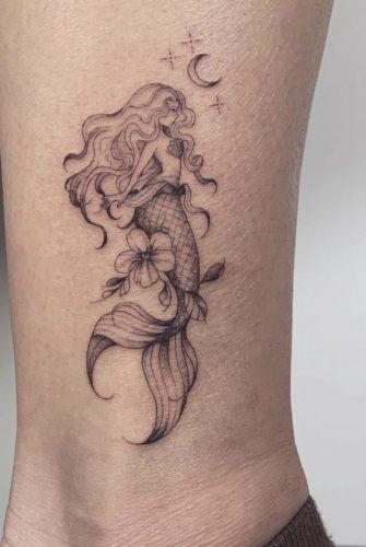 17 Magical Little Mermaid Tattoo Ideas for a Fantastical 2024 - Get Inspired Now! Little Mermaid Tattoo Ideas, Tattoo Ideas Hip, Small Mermaid Tattoo, Mermaid Tattoo Ideas, Ariel Tattoo, Little Mermaid Tattoo, Tattoo Dream, Rib Tattoos For Guys, Siren Tattoo