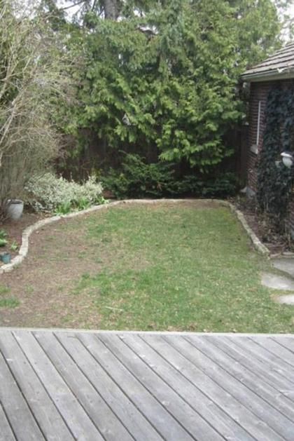 A before image of a patch of grass in a backyard Landscaping Off Patio, Small Backyard Hardscape Ideas, Backyard Sectioning Ideas, Backyard Parking Ideas, Small Hardscape Backyard, Slanted Backyard, Shared Backyard Ideas, Townhouse Backyard Landscaping, Small Backyard Layout Plans