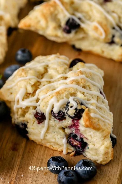 This Blueberry Scones recipe is full of fresh blueberries and has a delicious glaze. Set out a plate of these homemade scones with coffee or tea for an afternoon snack. #spendwithpennies #blueberryscones #recipe #scones #breakfast #dessert Blueberry Scones Easy, Rustic Breakfast, Lemon Blueberry Scones, Homemade Blueberry Pie, Berry Scones, Blueberry Scones Recipe, Homemade Icing, Blueberry Season, Scones Recipe Easy