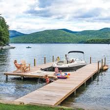 75 Beautiful Dock with No Cover Pictures & Ideas - March, 2021 | Houzz Dock Ideas Lakeside, Lake Docks Designs, Lake House Dock, Dock Design, Dock Ideas, Decking Options, Steel Channel, Lake Dock, Lakefront Living