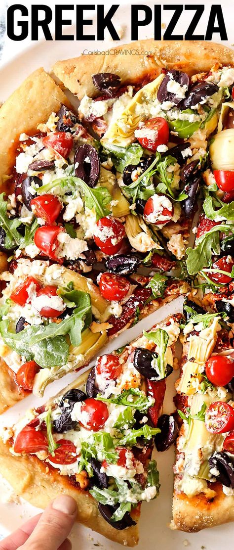 Greek Pizza exploding with your favorite Mediterranean flavors in pizza form including roasted red pepper sauce and tzatziki! Customize the pizza with all your favorite toppings! (Homemade or Store-bought Pizza Dough instructions) #dinner #dinnerrecipes #dinnerideas #recipes #recipeoftheday #recipeideas #greekfood #greekecipe #greekpizza #pizza #homemadepizza #pizzarecipe #pizzarecipes #feta #garlic #olives #redonions #roastedredpeppers #kalamataolives #tzatziki #greekyogurt #mozzarella Greek Pizza Recipe, Pizza Video, Diet Pizza, Mediterranean Pizza, Greek Pizza, Chicken Pizza Recipes, Roasted Red Pepper Sauce, Whole Wheat Pizza, Carlsbad Cravings