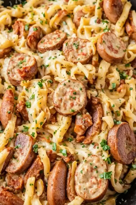 Smoked Sausage Cajun Alfredo Recipe

Ingredients

- 8 ounces fettuccine pasta
- 1 tablespoon olive oil
- 12 ounces smoked sausage, sliced
- 1 cup heavy cream
- 1 cup grated Parmesan cheese
- 1 tablespoon Cajun seasoning
- 1/2 teaspoon garlic powder
- Salt and pepper to taste
- Chopped parsley for garnish

Full Cooking Instructions on... Smoked Sausage Cajun Alfredo, Cajun Sausage Recipe, Beef Smoked Sausage Recipe, Cajun Alfredo Recipe, Smoked Pasta, Sausage Pasta Dinner, Smoked Sausage Recipes Pasta, Cajun Alfredo, Cajun Pasta Recipes