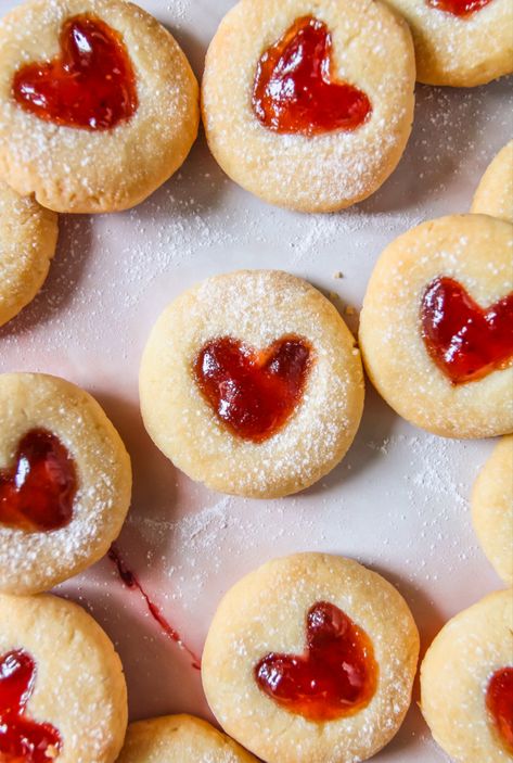 Vegan Strawberry Heart Thumbprint Cookies Heart Filled Cookies, Shortbread Cookies Aesthetic, Valentines Day Themed Food, Red Aesthetic Things, Shortbread Cookies With Jam, Bridgerton Flowers, Heart Thumbprint Cookies, Jam Drops Recipe, Picnic Cookies