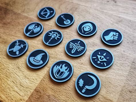 Introducing our 12 piece set of character class tokens for your D&D games! Our set includes all standard 5E character classes to help bring your D&D games to life. These tokens are available as digital downloads in STL format, so you can easily print them on your own 3D printer or send them to a professional printer. The files are also fully compatible with most virtual tabletop programs, allowing you to use them right away. Enhance your gameplay experience with this set of character tokens Character Classes, D D Classes, Virtual Tabletop, Dnd Classes, Gaming Token, Map Background, Magic Cards, Color Printer, Tabletop Rpg