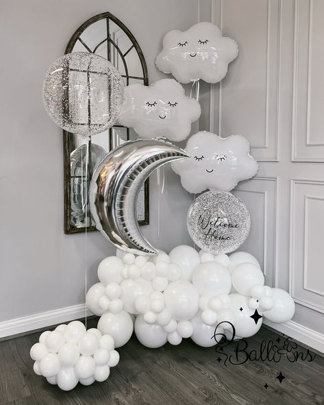 Welcome to a dreamy celebration! 🌙☁️ Our “Cloud & Moon” balloon setup is perfect for creating a magical and serene atmosphere for baby showers, birthdays, or welcome home events. Designed with adorable cloud balloons, a sparkling moon, and a cluster of fluffy white balloons, this setup is guaranteed to impress. 📍 Located in London 🚚 We deliver across the city! 💌 DM us to order your custom setup today! Add a touch of magic to your special day with Oballoons. 🥰🎈 #LondonBalloons #BalloonDe... 1st Birthday Cloud Theme, Welcome Home Baby Decor, Cloud Balloon Garland, Cloud Themed Baby Shower Ideas, Baby Welcome Decoration Home, Cloud Nine Baby Shower Theme, Baby Shower Cloud Theme, Cloud Theme Baby Shower Ideas, Dreamy Baby Shower Theme