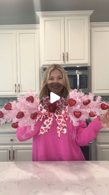 Laura Jeanne on Instagram: "Make this Valentine Swag for only $5.00!!! And everything you see is from Dollar Tree ♥️ You’ll need 2 pink trees, ribbon, and Valentine picks or mini ornaments.  I used floral wire and hot glue to connect the two trees and then used hot glue to adhere the hearts to the tree.  Just add your bow and voila!! #valentines #valentinesday2024 #valentinesdecor #foryoupagereels #foryourpage" Valentines Decorations Diy, Valentine Swag, Heart Wreath Diy, Hanger Christmas Tree, Diy Valentines Day Wreath, Valentine Wreath Diy, Valentine Door Decorations, Diy Tree Decor, Valentine Centerpieces