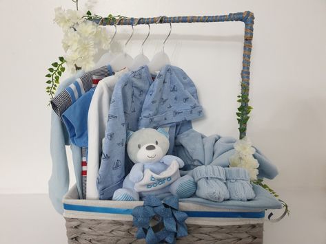 Beautiful gift for new born baby easy diy at home 😍💙 Easy Diy At Home, Baby Boy Gift Baskets, Baby Gift Wrapping, Shower Baskets, Baby Shower Gift Box, Baby Shower Baskets, Baby Shower Gift Basket, Baby Gift Hampers