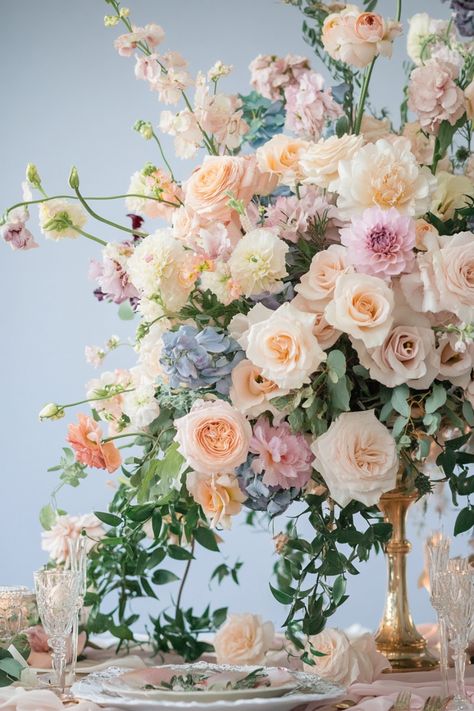 Discover 107 wedding flower ideas using pastel color palettes. These stunning arrangements will add a touch of softness and elegance to your big day. Perfect for any wedding theme, see how you can use these beautiful flowers! #WeddingColorPalettes #PastelIdeas #FloralInspiration Spring Wedding Flowers Peonies, Pastel Bouquet Of Flowers, Pastel Vintage Wedding Theme, Wedding Flowers Romantic, Vibrant Vintage Wedding, Garden Wedding Floral Arrangements, Garden Wedding Theme Ideas Color Schemes, August Wedding Flowers Centerpieces, Bridal Bouquet Pastel Colors