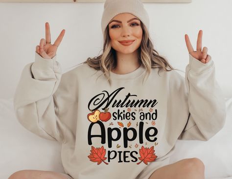 Autumn skies and apple pies by E-STYLE Fall Gender Reveal Outfit For Mom, Baby Feet Pumpkin, Pumpkin Patch Pregnancy Announcement, November Pregnancy Announcement, Unique Pregnancy Announcement Ideas, Thanksgiving Pregnancy Shirt, Thanksgiving Baby Announcement, Thanksgiving Pregnancy Announcement, Fall Pregnancy Announcement