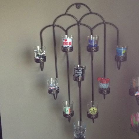 Use a tea light holder to display shot glasses. (Not sure what I want to do with the shot glasses yet, but this may be an option. Shot Glasses Display, Collectibles Display, Shot Glass Holder, Bar Decorations, Thrift Store Diy, Buddha Decor, Basement Inspiration, Glass Showcase, Diy Apartment Decor