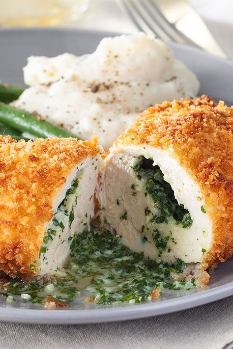 Looking for dinner ideas? Try cooking this chicken kiev. Use chicken breasts, parsley, and bread crumbs to cook this baked chicken recipe for a quick and easy dinner recipe. Chicken Kiev Recipe, Boneless Chicken Recipes, Chicken Breast Dishes, Chef John Recipes, Chicken Kiev, Stuffed Chicken Breasts, Chef John, Poultry Dishes, Chicken Stuffed