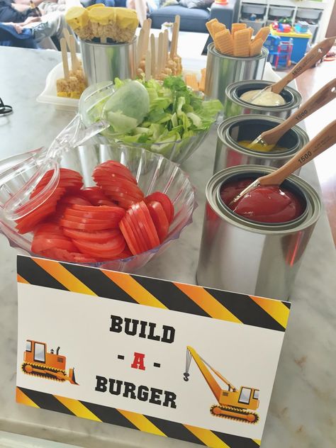 Build-a-Burger food station for a construction-themed birthday party.  Empty paint cans with small paint brushes make a great way to serve and display condiments. See more photos, décor and DIY project details from this party at www.fabeveryday.com. Construction Theme Birthday, Dump Truck Birthday, Construction Theme Birthday Party, Construction Theme Party, Truck Birthday Party, Construction Birthday Party, Construction Birthday Parties, Trucks Birthday Party, Construction Theme