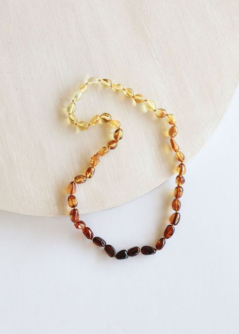 Baltic Amber is a fossilized tree resin and comes in a ⁠variety of shapes and colors. ⁠ 💚Amber contains succinic acid, a natural analgesic and ⁠healing agent which is why they are great for teething ⁠ babies. ⁠ 💚Amber will warm against your body and the succinic⁠ acid will be absorbed through your skin helping with pain relief.⁠ Luxury Amber Beaded Necklaces With Natural Stones, Cheap Amber Necklaces For Gifts, Cheap Amber Beaded Necklaces With Polished Beads, Luxury Amber Beaded Necklaces With Oval Beads, Affordable Amber Beaded Jewelry, Luxury Amber Oval Beaded Necklace, Luxury Baltic Amber Necklace In Amber Color, White Amber Necklace, Luxury Gold Baltic Amber Necklace