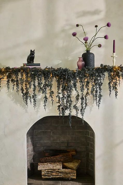 Halloween Décor & More | Anthropologie Halloween Decorations Indoor Minimalist, Neutral Halloween Mantle, Practical Magic Decor Inspiration, Dark Fall Decor, Halloween Decor Fireplace, Black Fall Decor, Gothic Halloween Decor, Halloween Living Room Decor, Whimsigoth Aesthetic