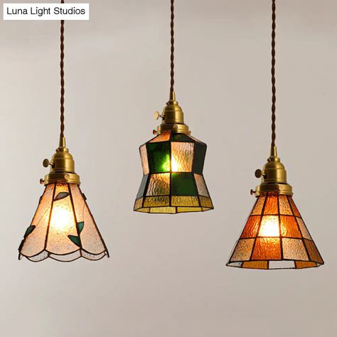 This sophisticated Tiffany-style hanging pendant light is the perfect addition to living rooms, bedrooms, dining rooms, and more. With its classic and timeless design, it features a brass coloured frame, a round canopy, and a variety of vivid glass shades including green, orange, yellow, light green, and white. Constructed from high-quality glass materials, this fixture is suitable for both indoor and outdoor use and comes complete with a 60" metal chain/cord and a 63" hanging wire. It is design Brass Bedroom, Stained Glass Pendant Light, Rooms Decoration, Glass Pendant Lights, Light Ideas, Tiffany Stained Glass, Modern Ceiling, Tiffany Style, Hanging Pendant Lights