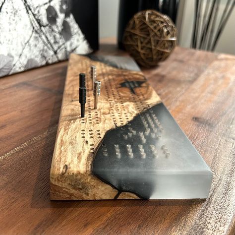 A very unique custom cribbage board made from west maple and blended with a semi-transparent smoky white epoxy that highlight the charred live edge details beneath. Really striking contrast and amazing looking crib board. Epoxy Cribbage Board, Live Edge Cribbage Board, Epoxy Wood Projects, Unique Cribbage Board, Crib Board, Custom Cribbage Board, Cribbage Board, Epoxy Resin Crafts, Wood Creations