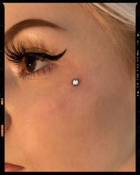 Piercing On Cheekbone, Simple Face Piercings, Face Cheek Piercing, Anti Brow Piercing Aesthetic, Dermal Piercing Face Cheek, Eyebrow Dermal Piercing, Anti Eyebrow Piercing Dermal, Upper Cheek Piercing, Tear Drop Piercing On Face