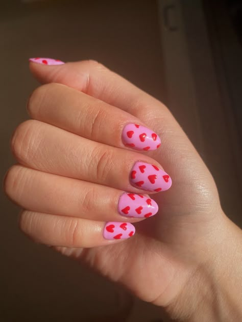 Light Pink Red Heart Nails, Heart Print Nails, Pink And Orange Valentines Nails, Pink With Red Heart Nails, Colorful Valentines Nails, Sparkle Heart Nails, Pink Heart Nails Acrylic, Valentines Nails Red And Pink, Hot Pink Valentines Nails