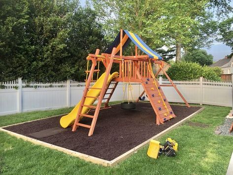 rubber mulch (wood border) Playground Border Ideas, Playground Mulch Ideas, Mulch Play Area For Kids, Mulch Under Playset, Rubber Mulch Play Area, Mulch Playground Area, Playground Landscaping Rubber Mulch, Outdoor Kids Play Area, Playground Surface