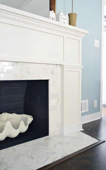 Young House Love | Fireplace Makeover: Stick A Fork In It | http://www.younghouselove.com Updated Fireplace, Fireplace Mantel Designs, Fireplace Redo, Mantel Design, Glam Life, Decor Fireplace, White Fireplace, Young House Love, Fireplace Hearth