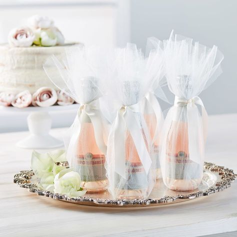 Special guests deserve special favors, so we made these tulle-wrapped champagne splits. They’re sophisticated, but oh-so-easy to put together. A little ribbon and a little tulle are all you need!  Make these DIY Tulle Champagne Bottle Wedding Favors in just a few steps Wedding Catering Ideas, Beautiful Wedding Centerpiece, How To Dress For A Wedding, Wedding Favors Ideas, Creative Wedding Favors, Inexpensive Wedding Favors, Simple Wedding Flowers, Wedding Planning On A Budget, Gift Favors