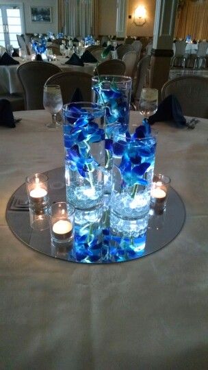 Table Flowers Arrangements, Centerpieces Orchids, Prom Centerpieces, Blue Floating Candles, Royal Blue Centerpieces, Wedding Centerpieces Blue, Flowers Arrangements Wedding, Blue Orchid Wedding, Centerpieces Blue