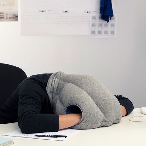 Get an ostrich nap pillow. | Napping Hacks To Help You Sleep Anywhere Ostrich Pillow, Nap Pillow, Office Gadgets, Power Nap, Take A Nap, Soft Pillows, Travel Pillow, Bean Bag Chair, Gadgets