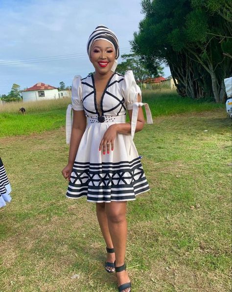 39 Latest Traditional Dresses 2024 - Best For Celebrities 8 Black And White Xhosa Traditional Dress, Umbaco Xhosa, Traditional Wedding Dresses South Africa, Xhosa Attire Traditional Dresses, Muscular Black Man, Xhosa Attire For Ladies, Wedding Dresses South Africa, Zulu Attire, Xhosa Outfits